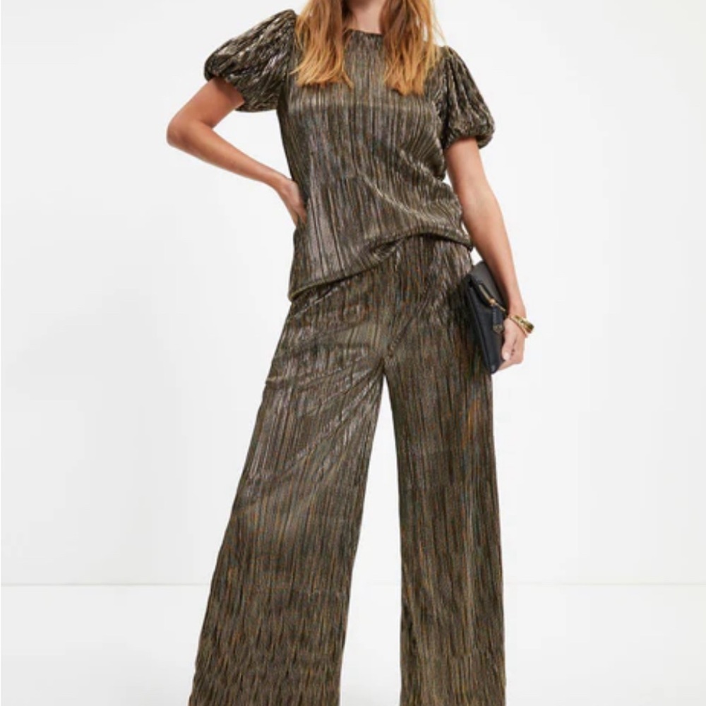 Black and gold pants and top.